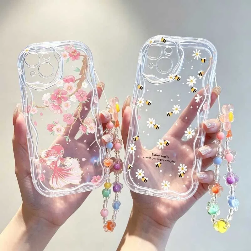 Cute Cartoon Wrist Strap Silicone Case - かわいい笑顔のミツバチと花のデザインが施された、Realme 16T、C85 PRO、C100i、C83、C71、C75、C63、C61、C65、C67、C55、C51、C53、16、15 PRO、Note 80、60に対応した、手首に装着できるケース。